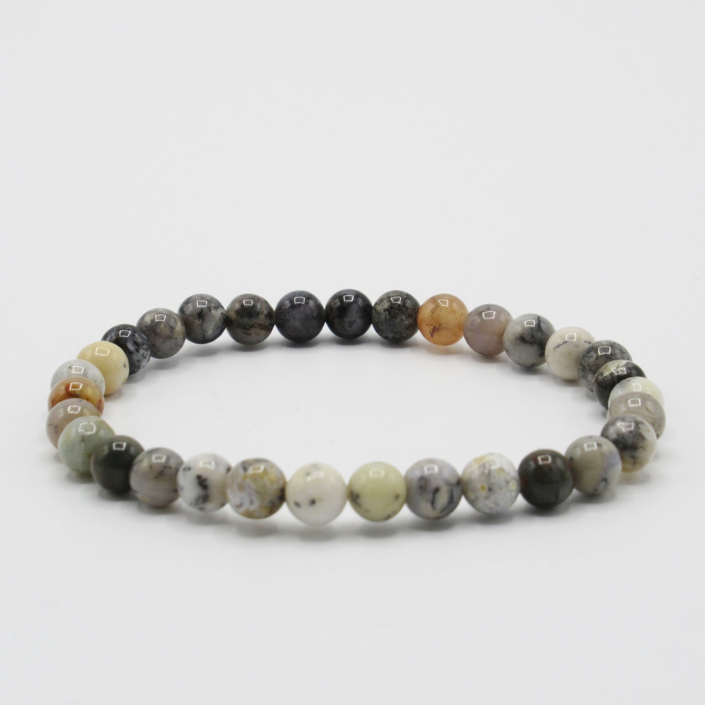 Bracelet Merlinite ou Opale Dentrique Femme/Homme en pierres naturelles… https://monjolicaillou.fr/products/bracelet-merlinite-ou-opale-dentrique-femme-homme-en-pierres-naturelles