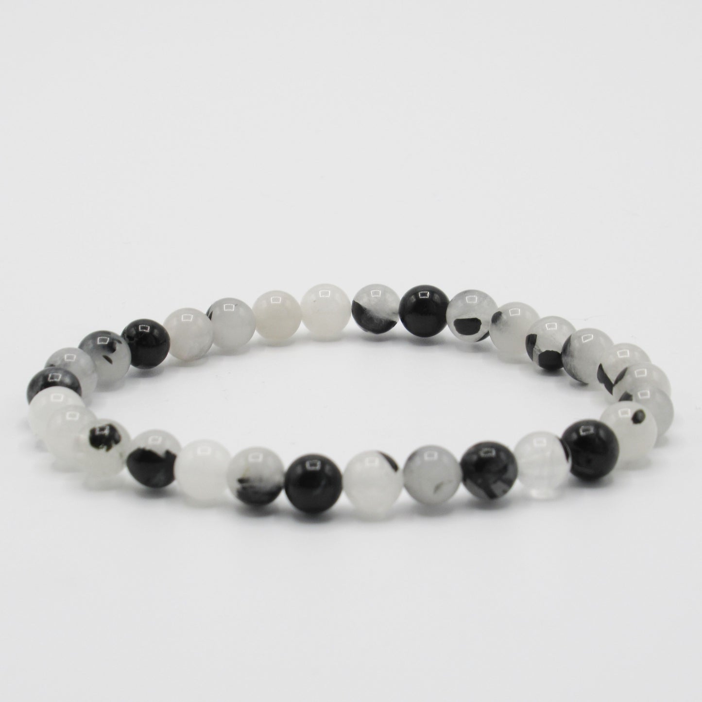 Bracelet Quartz Tourmaline Femme/Homme en pierres naturelles - 6 mm https://monjolicaillou.fr/products/bracelet-quartz-tourmaline-femme-homme-en-pierres-naturelles-6-mm