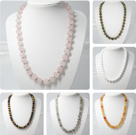 Colliers en perles naturelles - 10 mm  https://monjolicaillou.fr/products/colliers-en-perles-naturelles-10-mm  Découvrez des colliers élégants en perles naturelles de 10 mm. Ajoutez une touche de sophistication à votre look avec ces colliers de perles de qualité supérieure. Parfait pour toutes les occasions, ces colliers vous feront vous sentir chic et confiant. Ajoutez-les à votre collection de bijoux dès aujourd'hui ! 