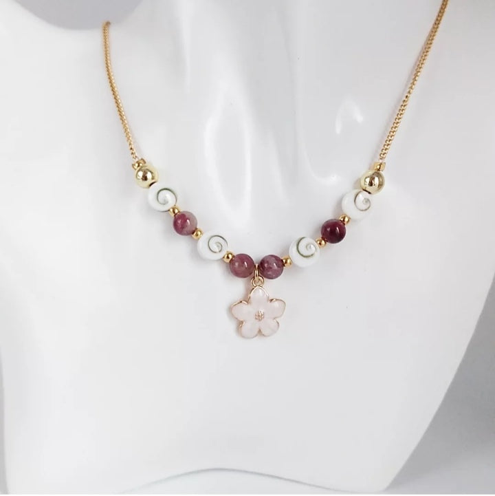 Collier en pierre naturelle Œil de Sainte Lucie et Tourmaline Rose – porte-bonheur, protection et amour inconditionnel. Bijou artisanal unique.