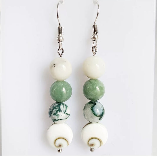 Attirez la chance, la prospérité et la protection avec notre sélection de pierres porte-bonheur : Œil de Sainte-Lucie, Agate Mousse, Jade, Merlinite.
