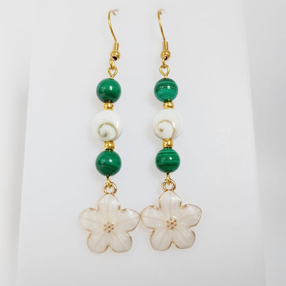 Découvrez nos boucles d'oreilles en Œil de Sainte-Lucie et pierres naturelles. Bouclier de protection, sérénité et vitalité au quotidien. Trouvez votre pierre !