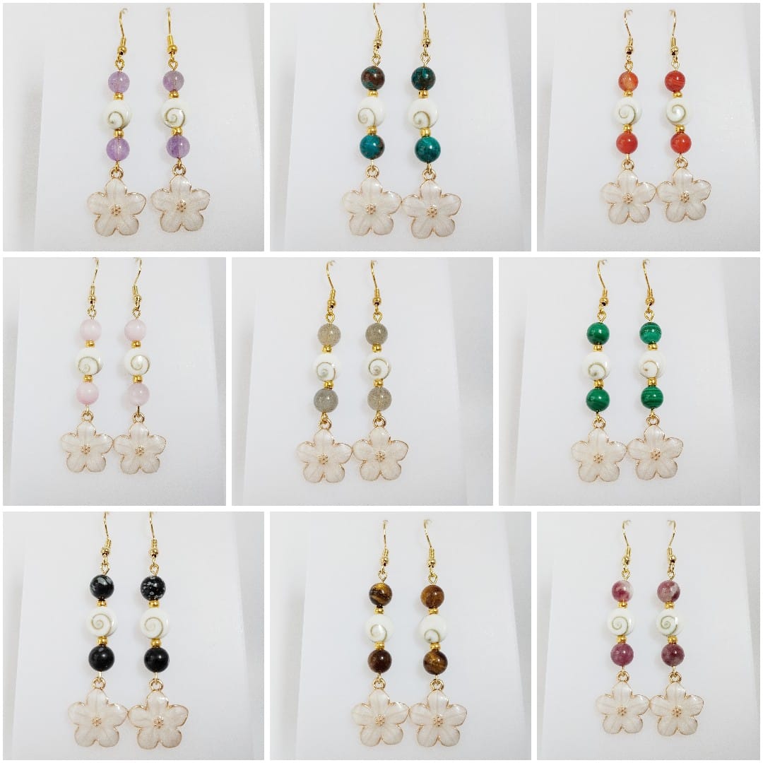 Découvrez nos boucles d'oreilles en Œil de Sainte-Lucie et pierres naturelles. Bouclier de protection, sérénité et vitalité au quotidien. Trouvez votre pierre !