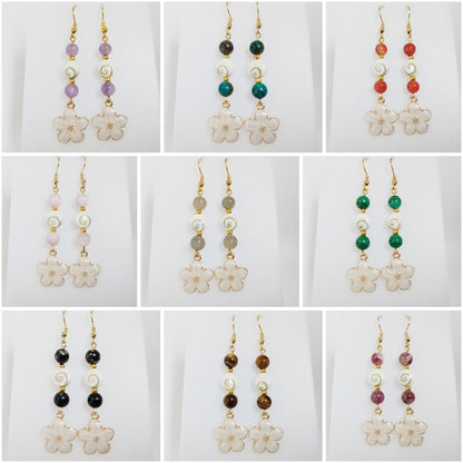Découvrez nos boucles d'oreilles en Œil de Sainte-Lucie et pierres naturelles. Bouclier de protection, sérénité et vitalité au quotidien. Trouvez votre pierre !