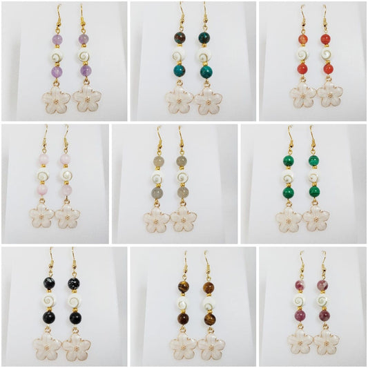 Découvrez nos boucles d'oreilles en Œil de Sainte-Lucie et pierres naturelles. Bouclier de protection, sérénité et vitalité au quotidien. Trouvez votre pierre !