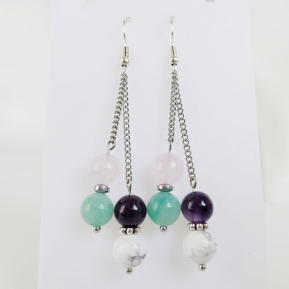 Découvrez nos boucles d'oreilles anti-stress en pierres naturelles. Une synergie apaisante de 4 pierres pour chasser les peurs et retrouver une vie sereine. 2 modèles au choix.