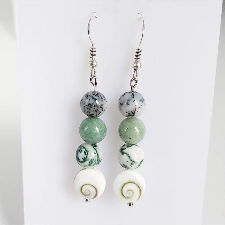 Attirez la chance, la prospérité et la protection avec notre sélection de pierres porte-bonheur : Œil de Sainte-Lucie, Agate Mousse, Jade, Merlinite.

