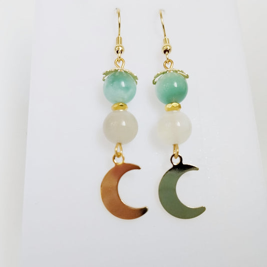 Une alliance délicate de Pierre de Lune et de Garnierite pour un bijou féminin, naturel et symbolique, inspiré par la douceur lunaire et l’intuition.
