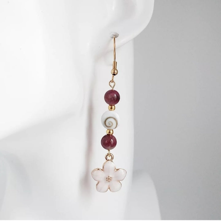 Boucles d’oreilles en pierres naturelles Œil de Sainte Lucie et Tourmaline Rose – bijou élégant de protection et d’amour. Favorise la paix intérieure et la douceur du cœur.