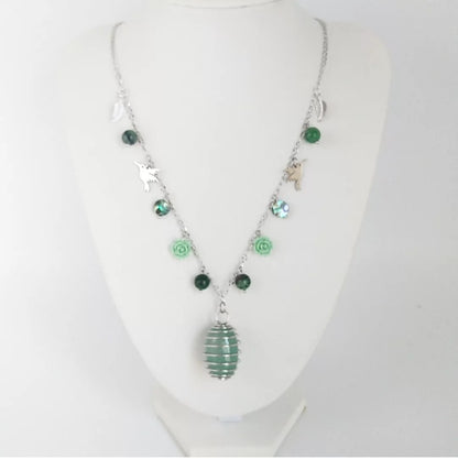 Découvrez le collier Aventurine Verte, Rubis sur Zoïsite et Nacre Abalone – un bijou artisanal en pierres naturelles, symbole de joie, sérénité et force intérieure.