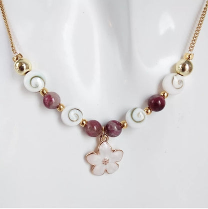 Collier en pierre naturelle Œil de Sainte Lucie et Tourmaline Rose – porte-bonheur, protection et amour inconditionnel. Bijou artisanal unique.