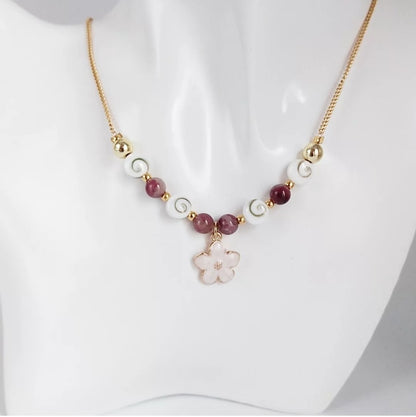 Collier en pierre naturelle Œil de Sainte Lucie et Tourmaline Rose – porte-bonheur, protection et amour inconditionnel. Bijou artisanal unique.