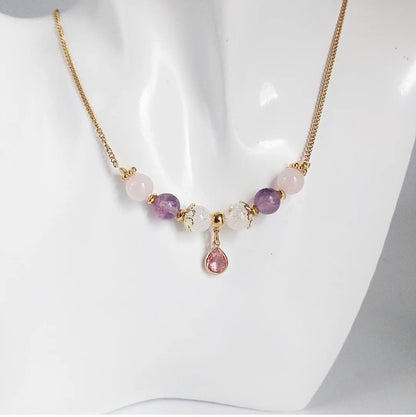 Collier en pierres naturelles Fluorite Pourpre & Quartz Rose. Apaise le cœur, clarifie l’esprit et diffuse amour et sérénité au quotidien.