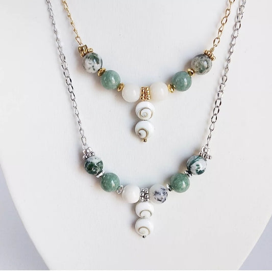 Attirez la chance, la prospérité et la protection avec notre sélection de pierres porte-bonheur : Œil de Sainte-Lucie, Agate Mousse, Jade, Merlinite.
