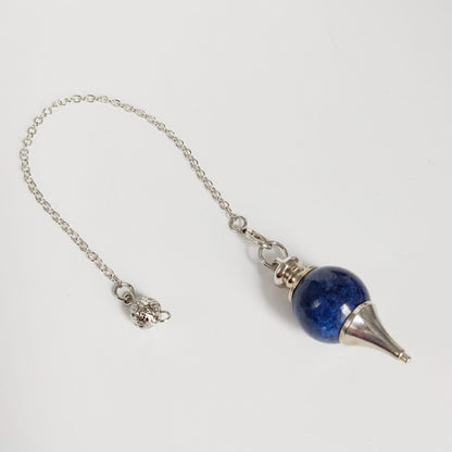 Pendule sphère en pierres naturelles : Cornaline, Jaspe Rouge, Lapis Lazuli, Pierre de Lave et Quartz Rose. Idéal pour la radiesthésie, la méditation et le bien-être énergétique.