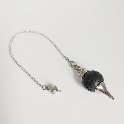 Pendule sphère en pierres naturelles : Cornaline, Jaspe Rouge, Lapis Lazuli, Pierre de Lave et Quartz Rose. Idéal pour la radiesthésie, la méditation et le bien-être énergétique.