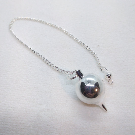 Pendule Boule en métal argenté